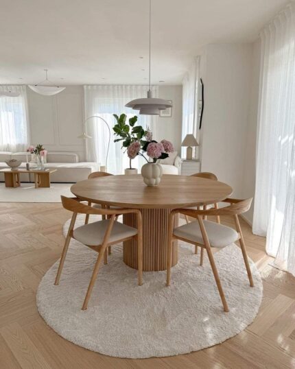 Modern circular dining table made of beech wood